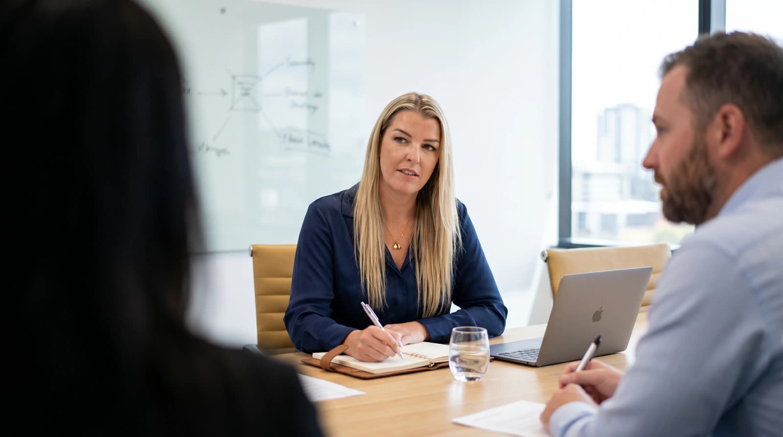 Business team reviewing insurance cover in a meeting