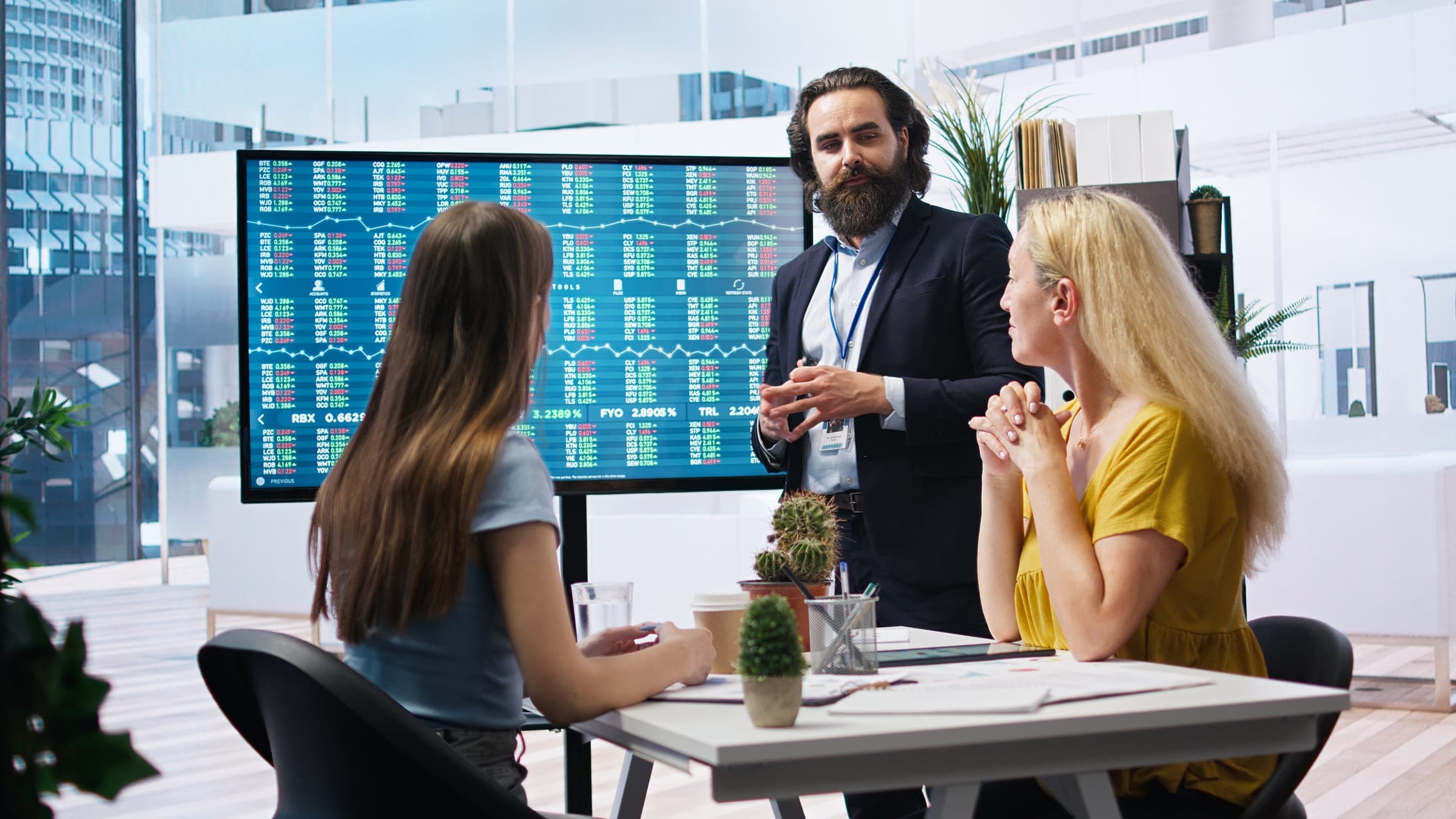 Business Structure Discussion Business meeting discussing insurance for sole trader or company structure.