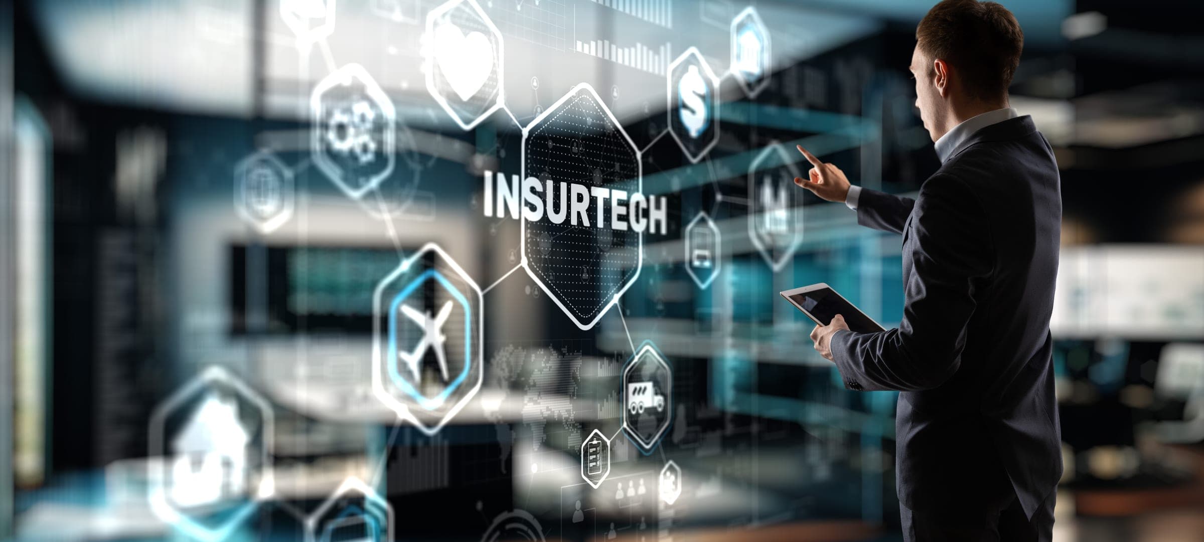 Businessman interacting with virtual screen on ISR insurance for high-value commercial property.